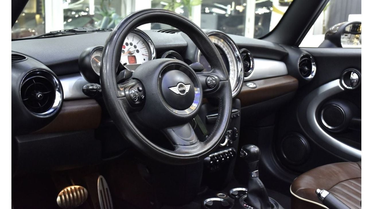 Mini Cooper S EXCELLENT DEAL for our Mini Cooper S Convertible ( 2011 Model ) in Brown Color GCC Specs