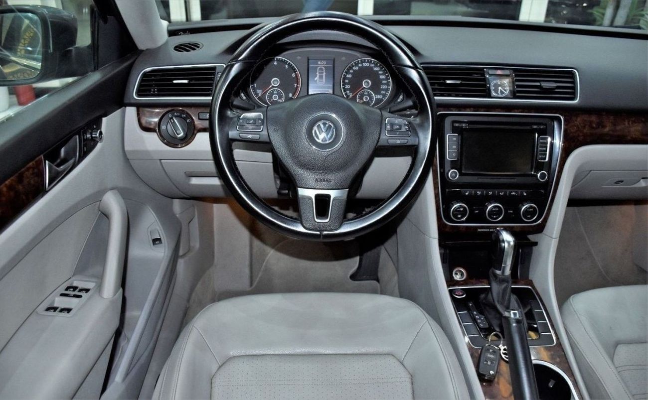 Volkswagen Passat EXCELLENT DEAL for our Volkswagen Passat ( 2013 Model ) in Silver / Grey Color GCC Specs