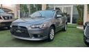 Mitsubishi Lancer Gulf gray color, inside beige without accidents, rear wing sensors, fog lights, in excellent conditi