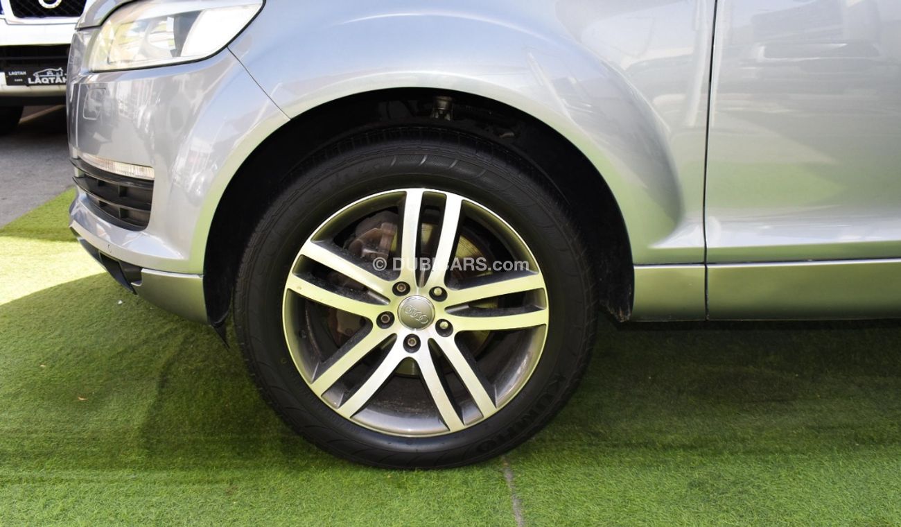 Audi Q7 2009 GCC model, silver color, saffron interior, leather panorama, cruise control, sensor wheels, in