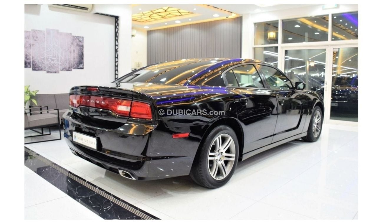 Dodge Charger EXCELLENT DEAL for our Dodge Charger ( 2014 Model ) in Black Color GCC Specs