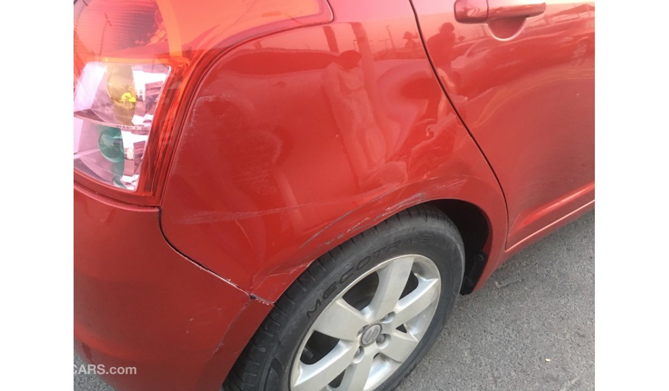 Suzuki Swift clean from the agency's first owner 2009 red color