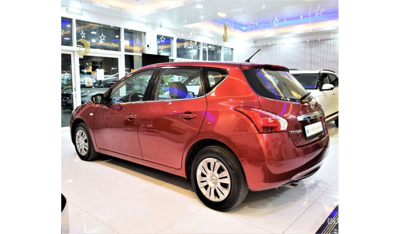 نيسان تيدا LOW MILEAGE! FULL SERVICE HISTORY! ONLY 31,000 KM Nissan Tiida 2016 Model!! in Red Color! GCC Specs