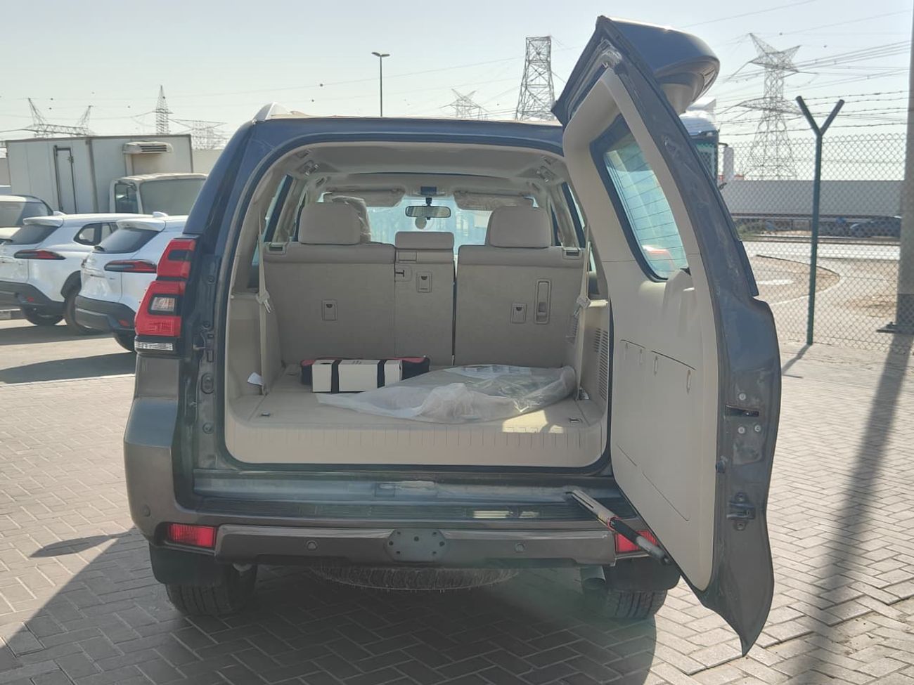 تويوتا برادو 2023 Toyota Prado TXL Spare-Down 7-Seater 4.0L V6 Petrol A/T 4WD Export Only