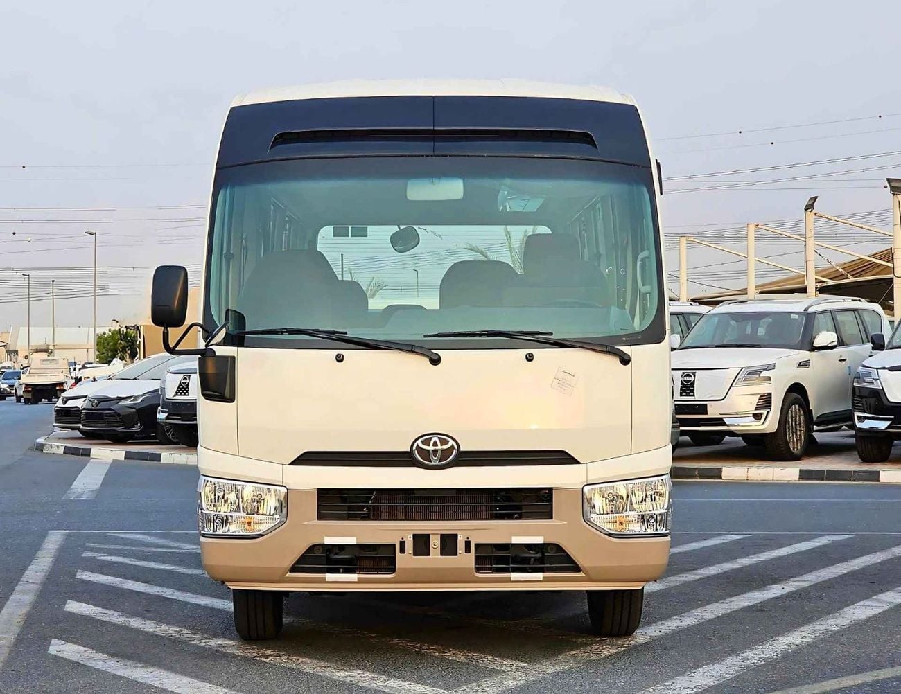 Toyota Coaster 2.7L PETROL M/T DUAL TONE / 23 SEATER / AUTO DOOR / HLF LUGGAGE RACK (CODE#COPB)