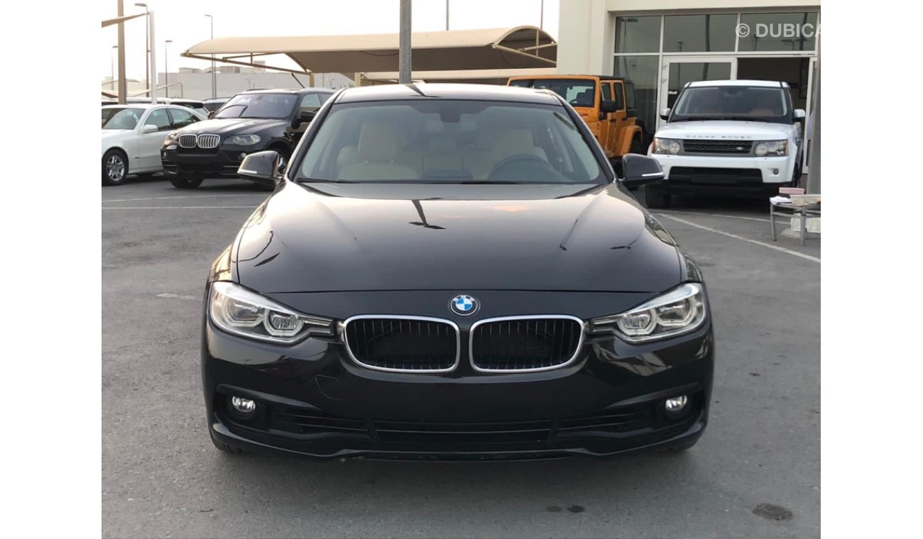 BMW 320i Bmw320 model 2018 GCC car prefect condition full option back camera screen navigation Bluetooth rad