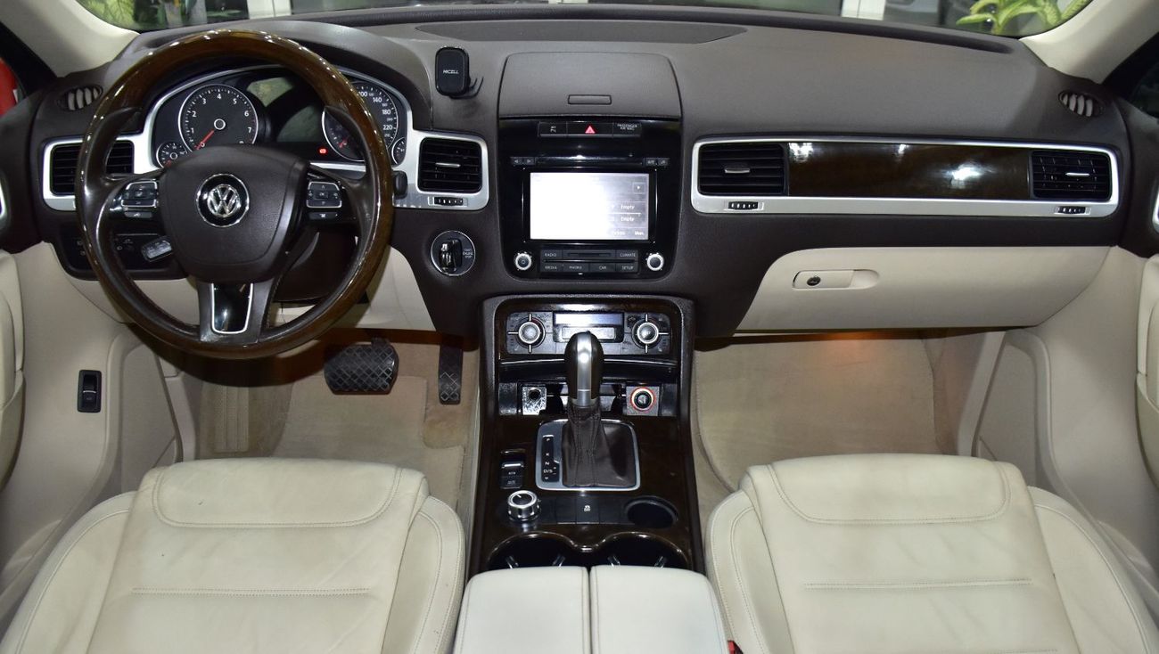 Volkswagen Touareg SEL EXCELLENT DEAL for our Volkswagen Touareg ( 2015 Model ) in Brown Color GCC Specs