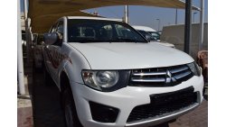 Mitsubishi L200 Mitsubishi L200 d/c pick up 4x4,model:2013.Excellent condition