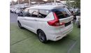 Suzuki Ertiga Gulf model 2019, agency dye, 1600 cc, imprint, white color, rear wing, alloy wheels, air conditionin