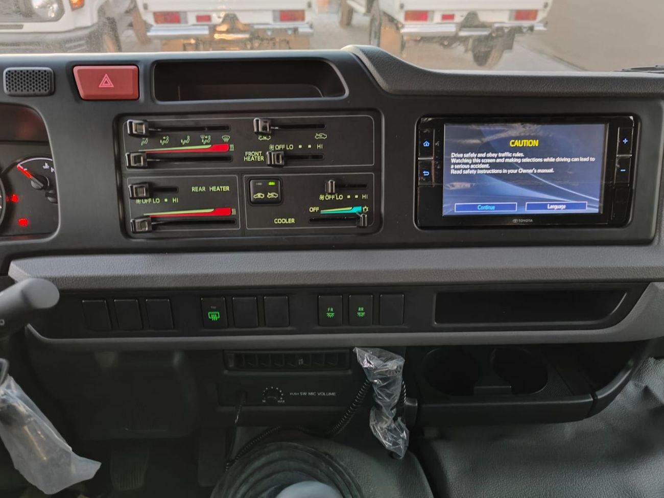 تويوتا كوستر 2025 Toyota Coaster High-Roof 23-Seater (3-Point Seatbelts) 4.0L 4-Cyl Turbo Diesel M/T RWD