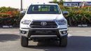 تويوتا هيلوكس SR5 ECTAGR005 – 2026 Toyota Hilux Double Cab 2.7L Petrol Manual 4wd – White w Red