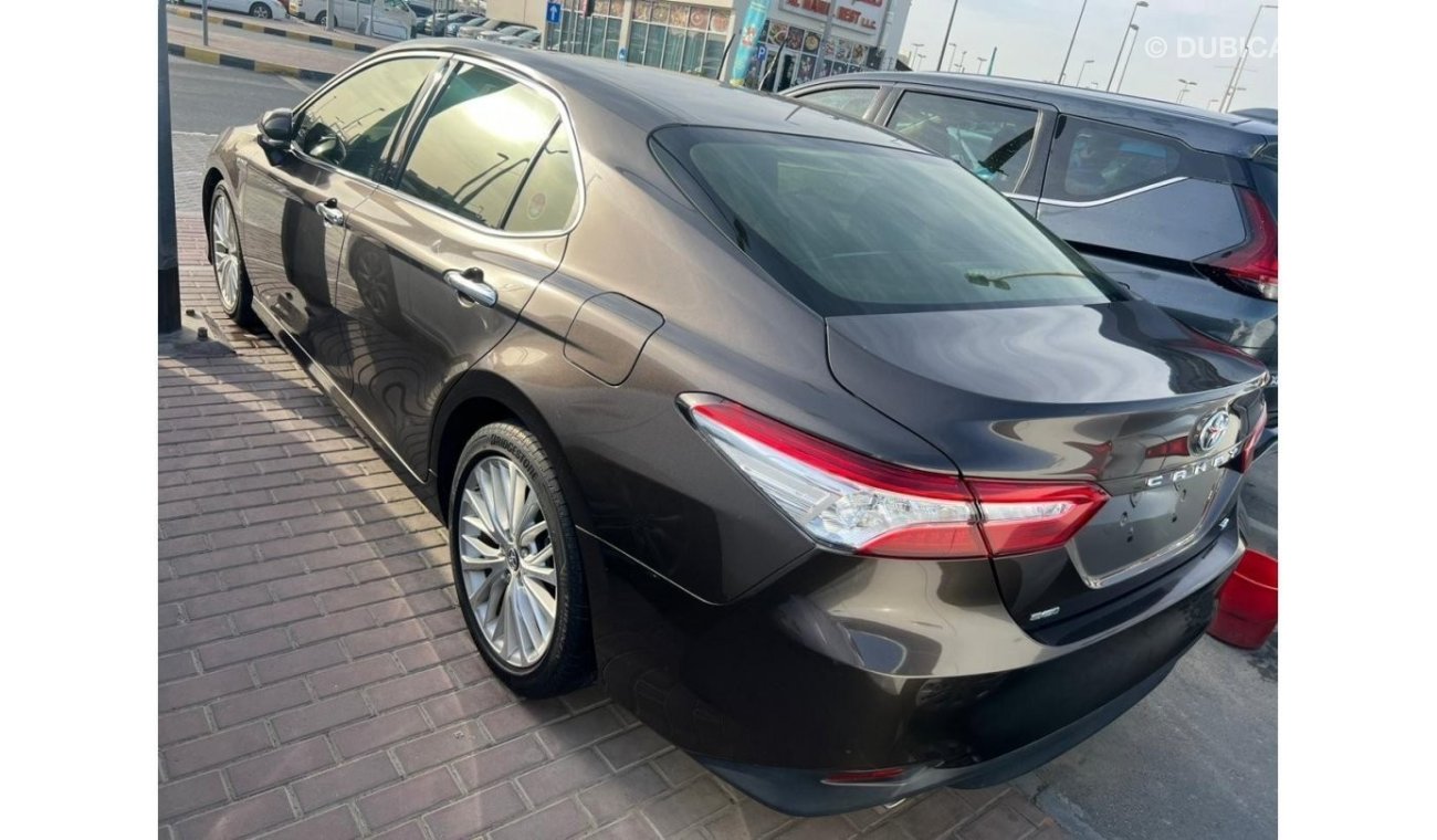 Toyota Camry 2020 GCC model, agency dye, brown color, beige interior, leather hatch, alloy wheels, mirror sensors