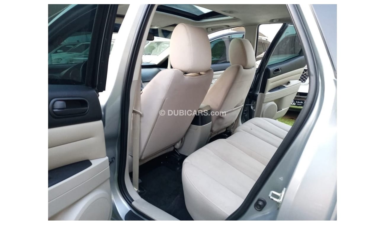 Mazda CX7 Mazda CX7, 2012 model, Gulf, gray color, one number, slot, cruise control, wooden wheels, rear spoil