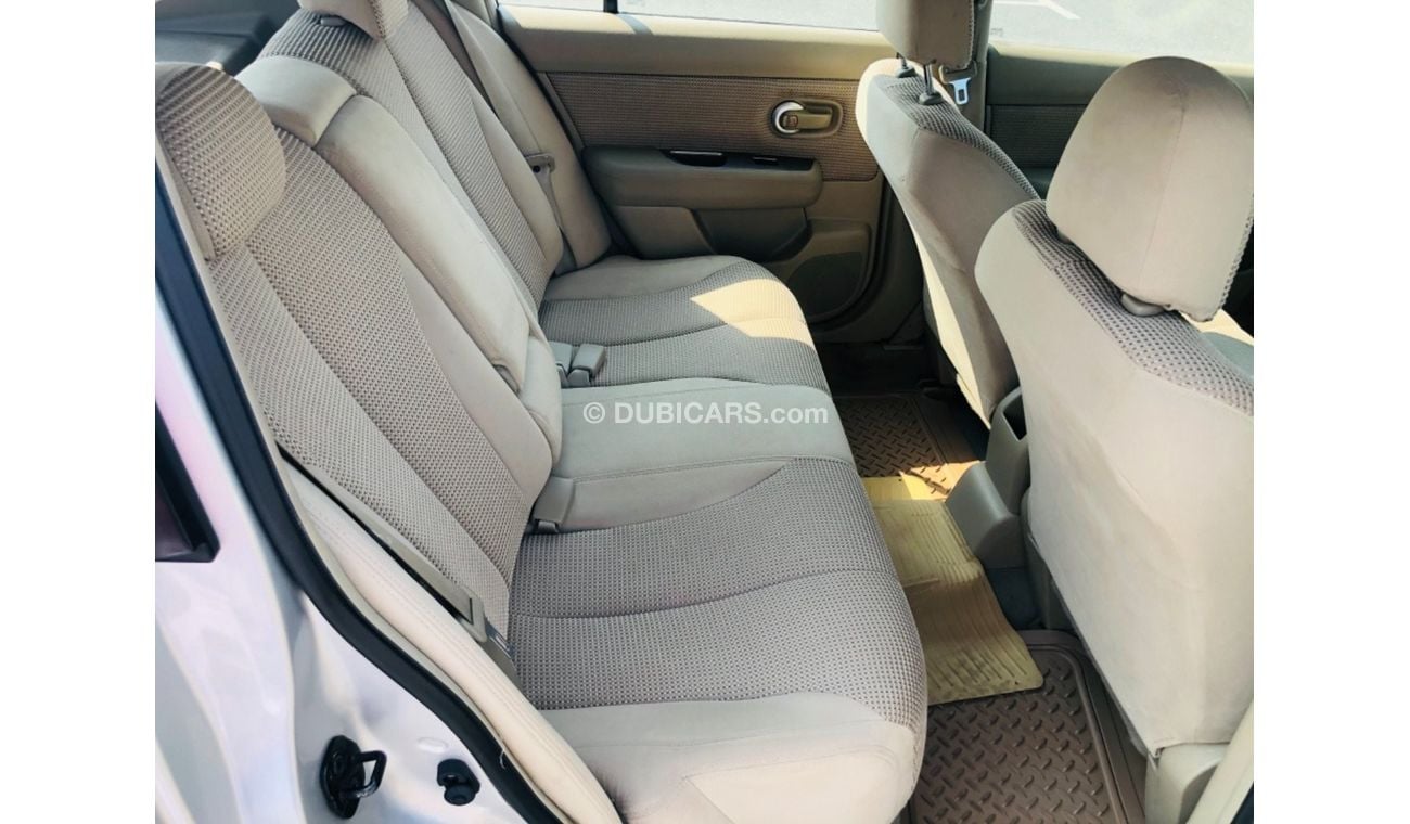 نيسان تيدا موديل 2012 خليجي فل مواصفات فتحه سقف مالك واحد من الوكاله مفتاحين فل مواصفات فتحه سقف