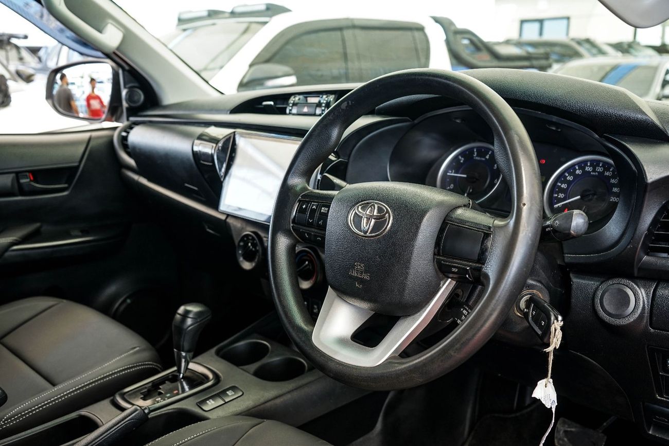 تويوتا هيلوكس The Toyota Hilux is a legendary, mid-size pickup truck known for its exceptional ruggedness, durabli