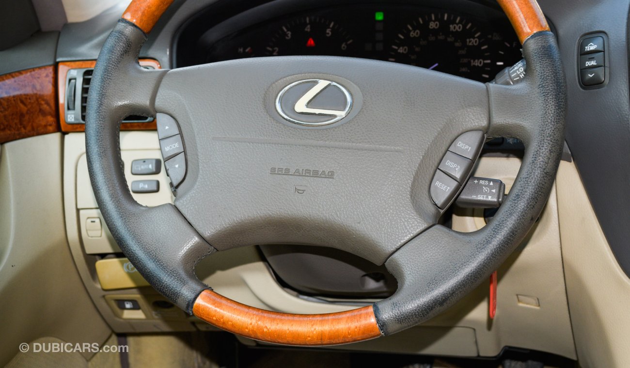 Lexus LS 430 Imported 1/2 Ultra 2006 model, white color, leather opening, wooden wheels, electric mirrors, electr