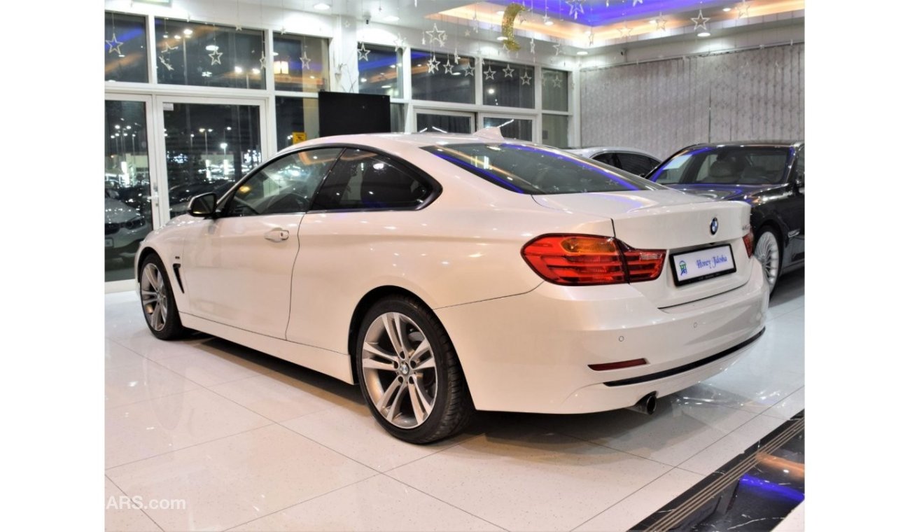 BMW 420i EXCELLENT DEAL for our BMW 420i Sport ( 435i Badge ) ( 2015 Model! ) in White Color! GCC Specs