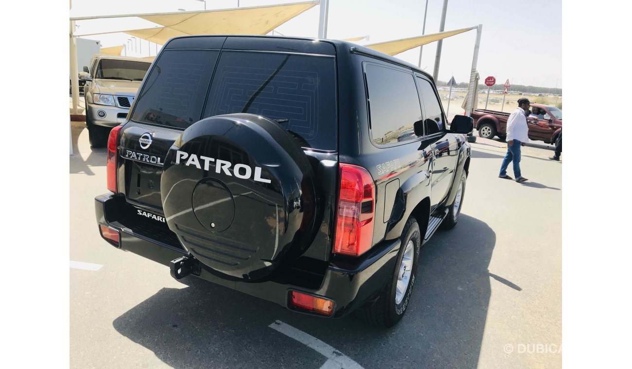 Nissan Patrol Safari فل ابشن صبغة وكاله تشييكات وكاله بحاله ممتاذه