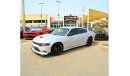 Dodge Charger R/T The Charger RT is powered by a 5.7-liter HEMI V8 engine that produces 370 horsepower and 535 Nm