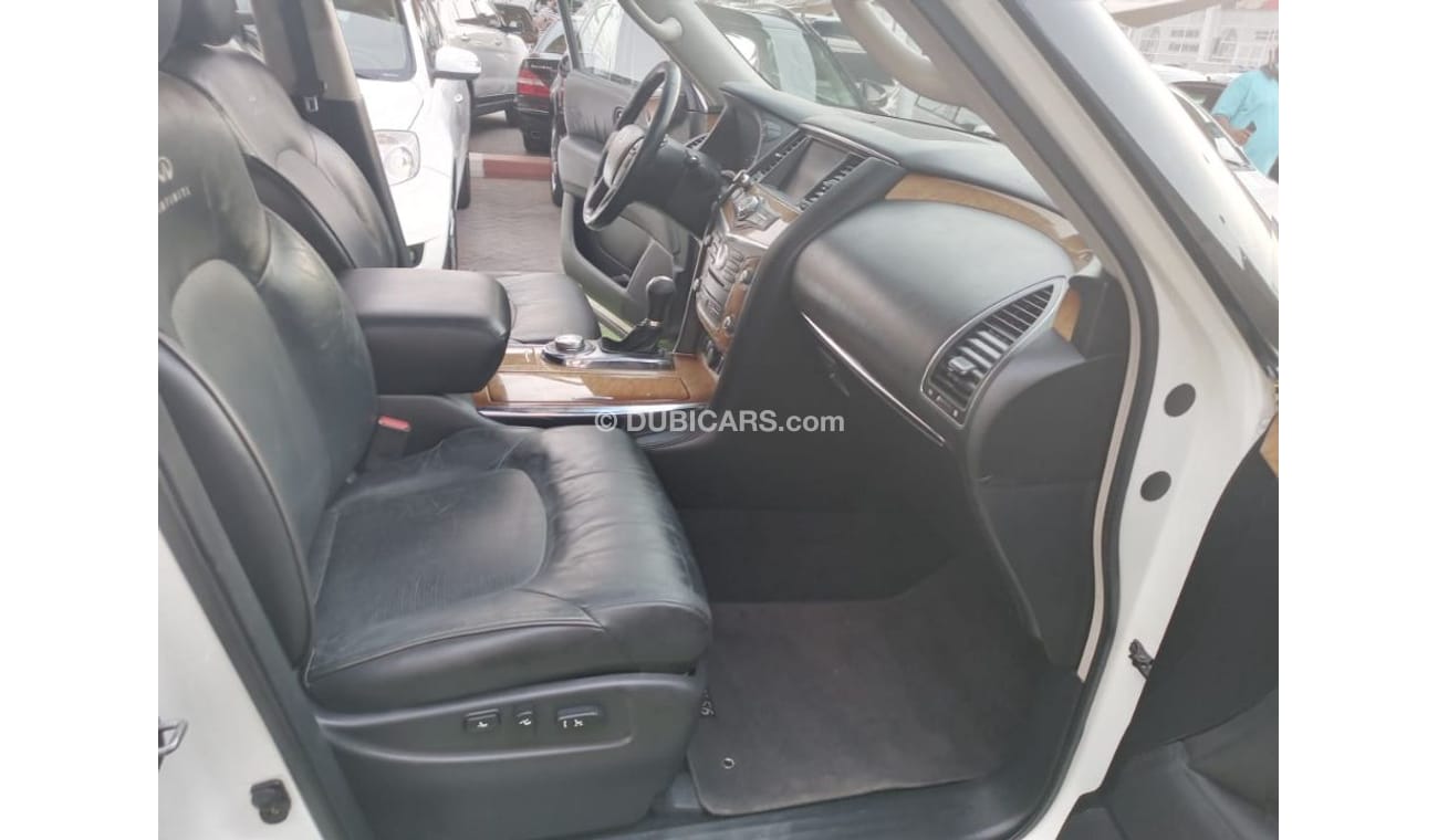 Infiniti QX56 Model 2011 imported, white color, leather opening, alloy wheels, sensors, speed stabilizer, in excel