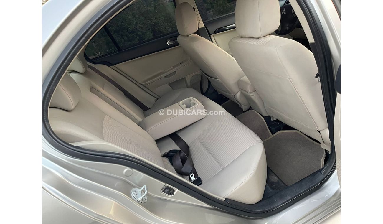 Mitsubishi Lancer MITSUBISHI LANCER 2,0 - GLS- mobile 2014 Excellent Conditio  Very celen car Full automatic Free acci