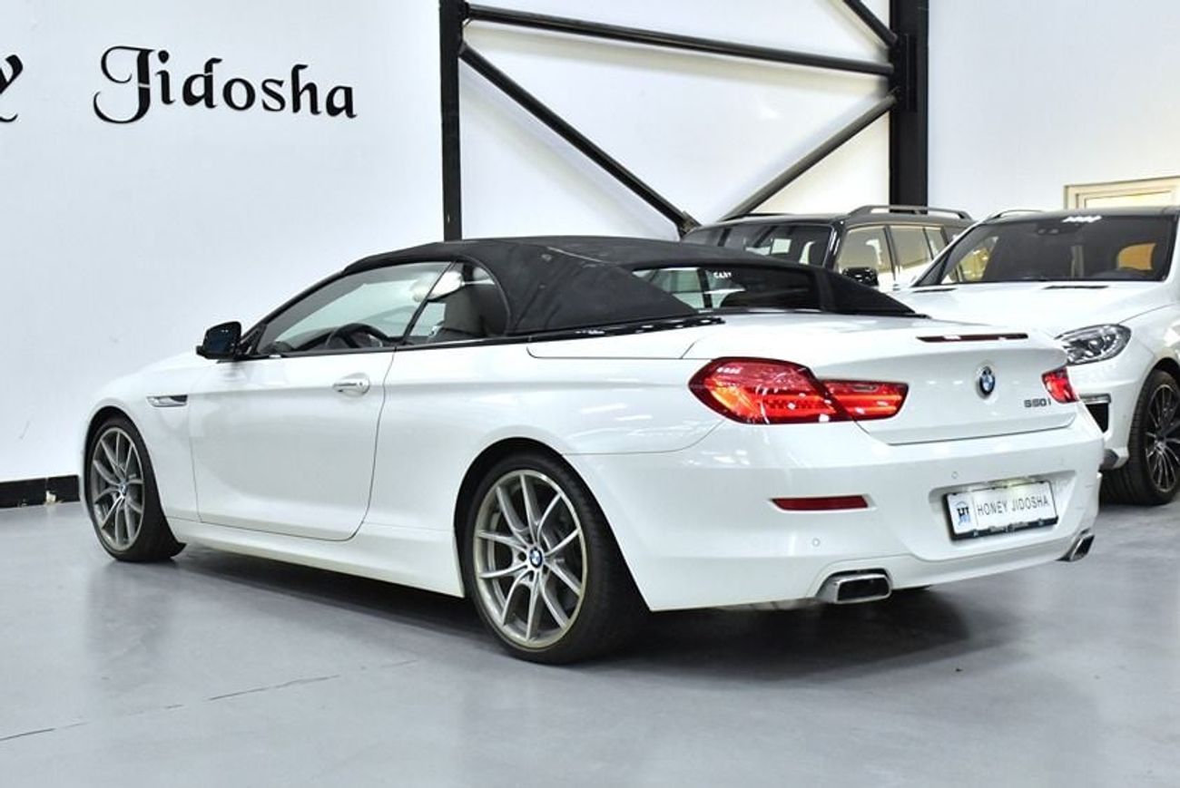 BMW 650i EXCELLENT DEAL for our BMW 650i CONVERTIBLE ( 2011 Model ) in White Color GCC Specs