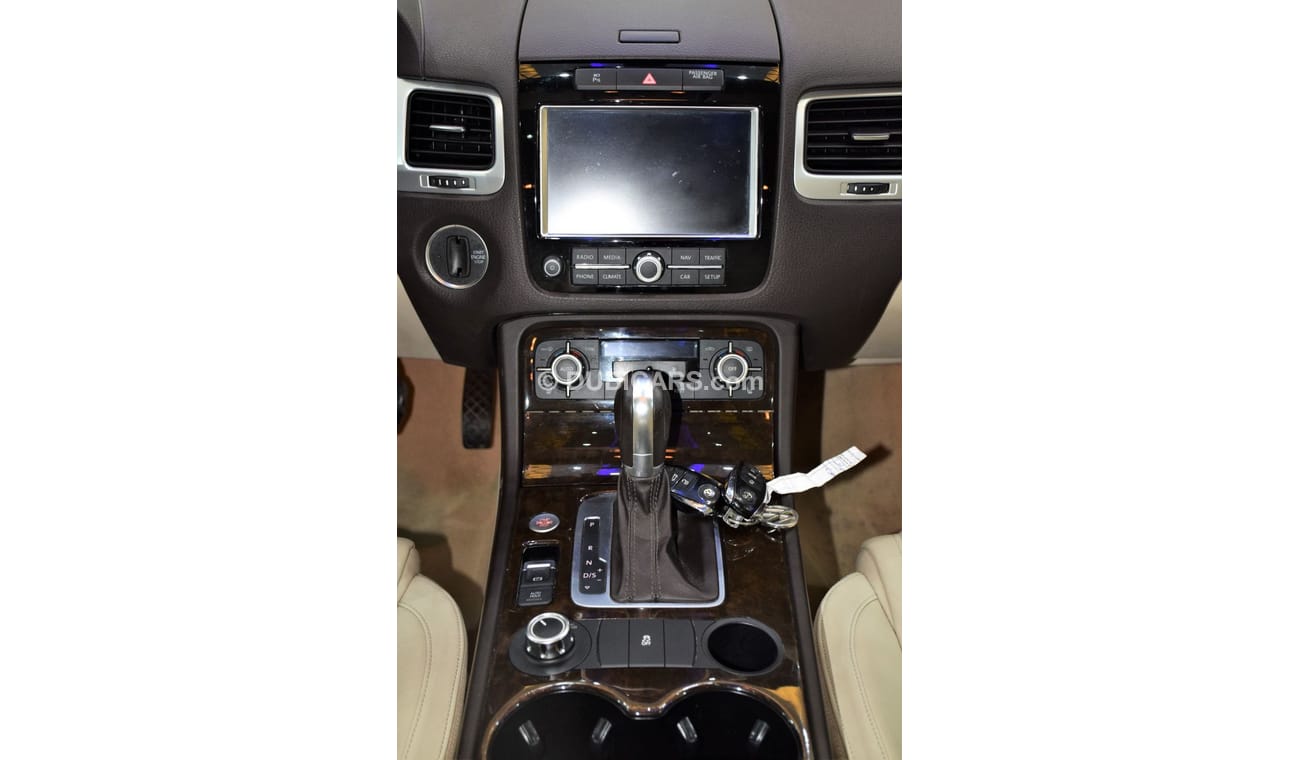 Volkswagen Touareg SEL EXCELLENT DEAL for our Volkswagen Touareg ( 2015 Model! ) in Blue Color! GCC Specs