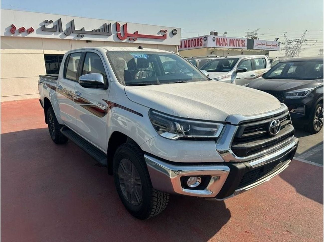 Toyota Hilux TOYOTA HILUX 2.7 AT FULL OPTION WITH PUSH START WHITE OMAN SPEC 2025