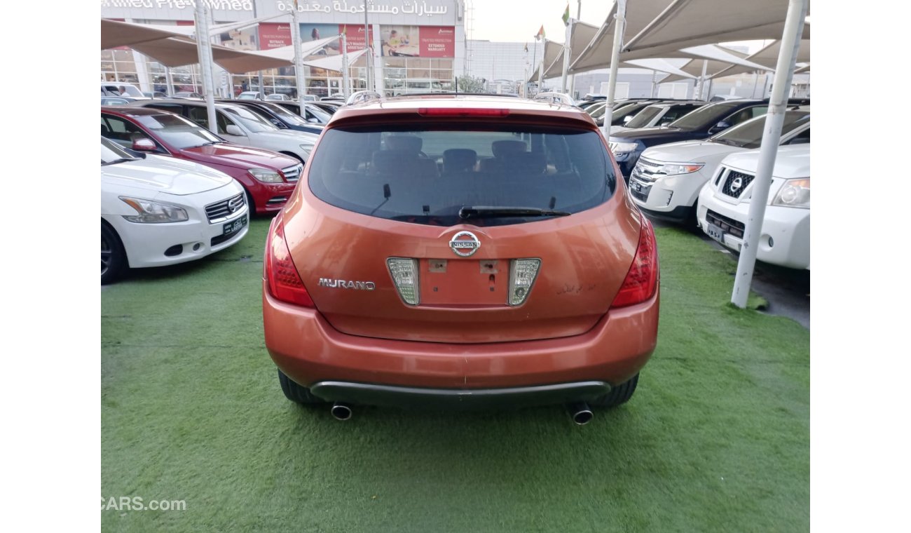 Nissan Murano Model 2008 Gulf Orange color number one Leather alloy wheels sensors in excellent condition, you do