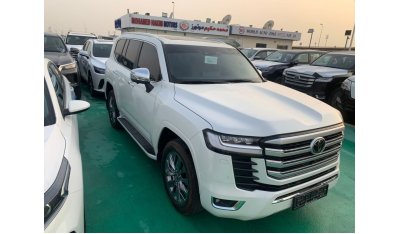 تويوتا لاند كروزر 2023 TOYOTA LAND CRUISER LC300 4.0L VXR WHITE - BEIGE AUTOMATIC FULL OPTION