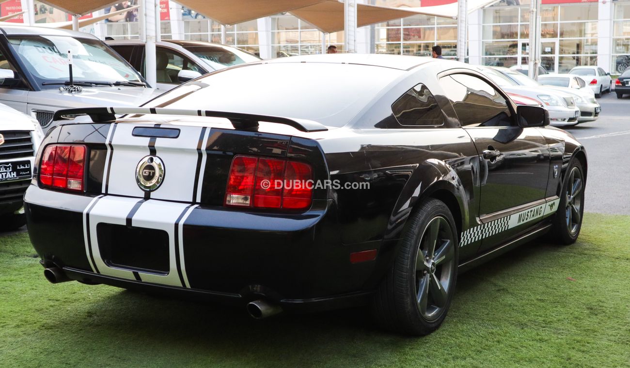 فورد موستانج خليجى كوبيه موديل 2009 لون أسود بحالة ممتازة لاتحتاج لأى مصاريف