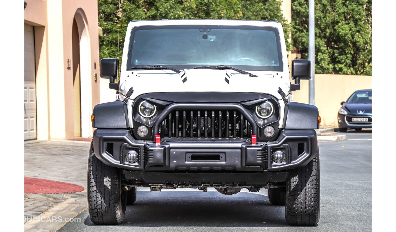 Jeep Wrangler Sport 2014 GCC under warranty with Zero Down-Payment.