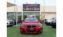 BMW 320i i Gulf Specs Red Color 2009 model in good condition