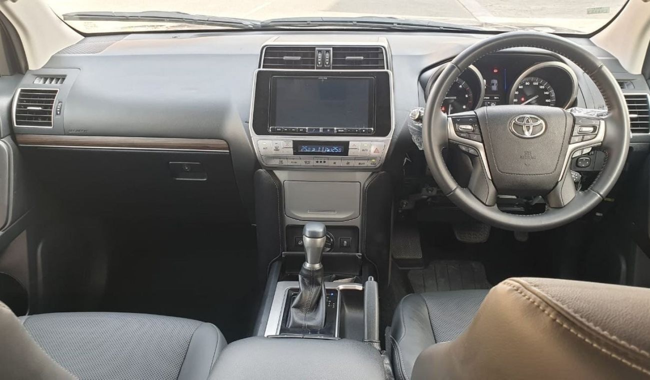 Toyota Prado RHD Diesel full option 7 seats leather seats electric seats with sunroof facelifted from inside and