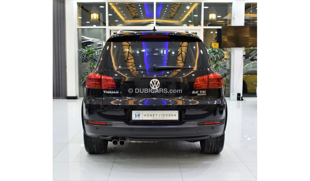 Volkswagen Tiguan SEL EXCELLENT DEAL for our Volkswagen Tiguan 2.0 TSi 4Motion ( 2014 Model! ) in Black Color! GCC Spe