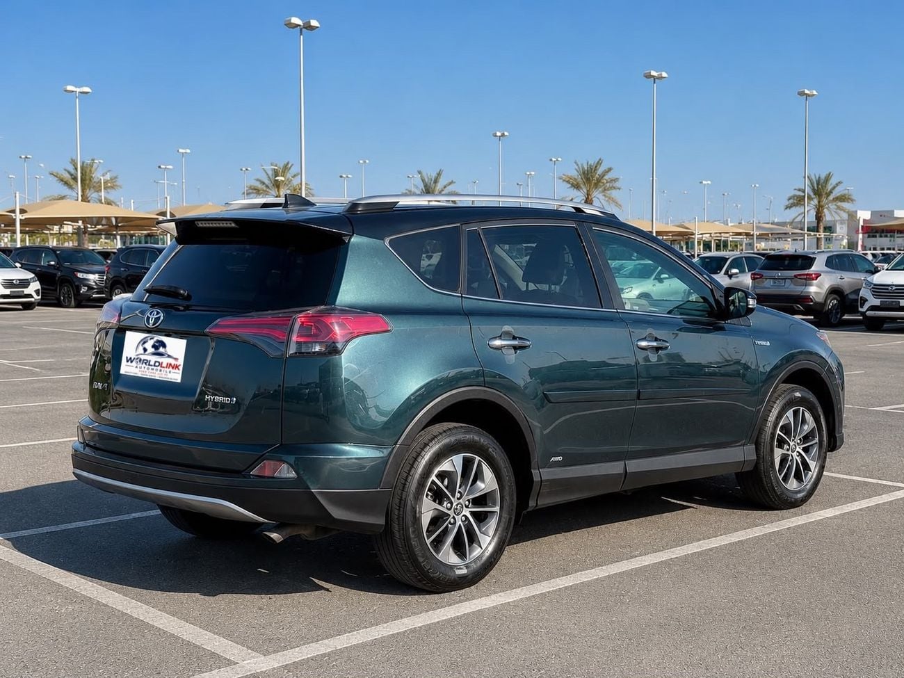 Toyota RAV4 LE 2.5L Cylinder 4 Hybrid Automatic 5 Seats 5 Doors