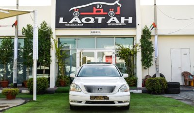 Lexus LS 430 Imported 1/2 Ultra, model 2006, white color, leather opening, wooden wheels, electric mirrors, excel