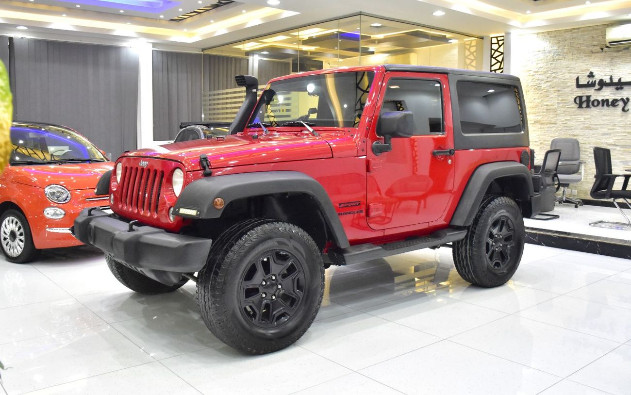 Jeep Wrangler EXCELLENT DEAL for our Jeep Wrangler Sport ( 2014 Model ) in Red Color GCC Specs