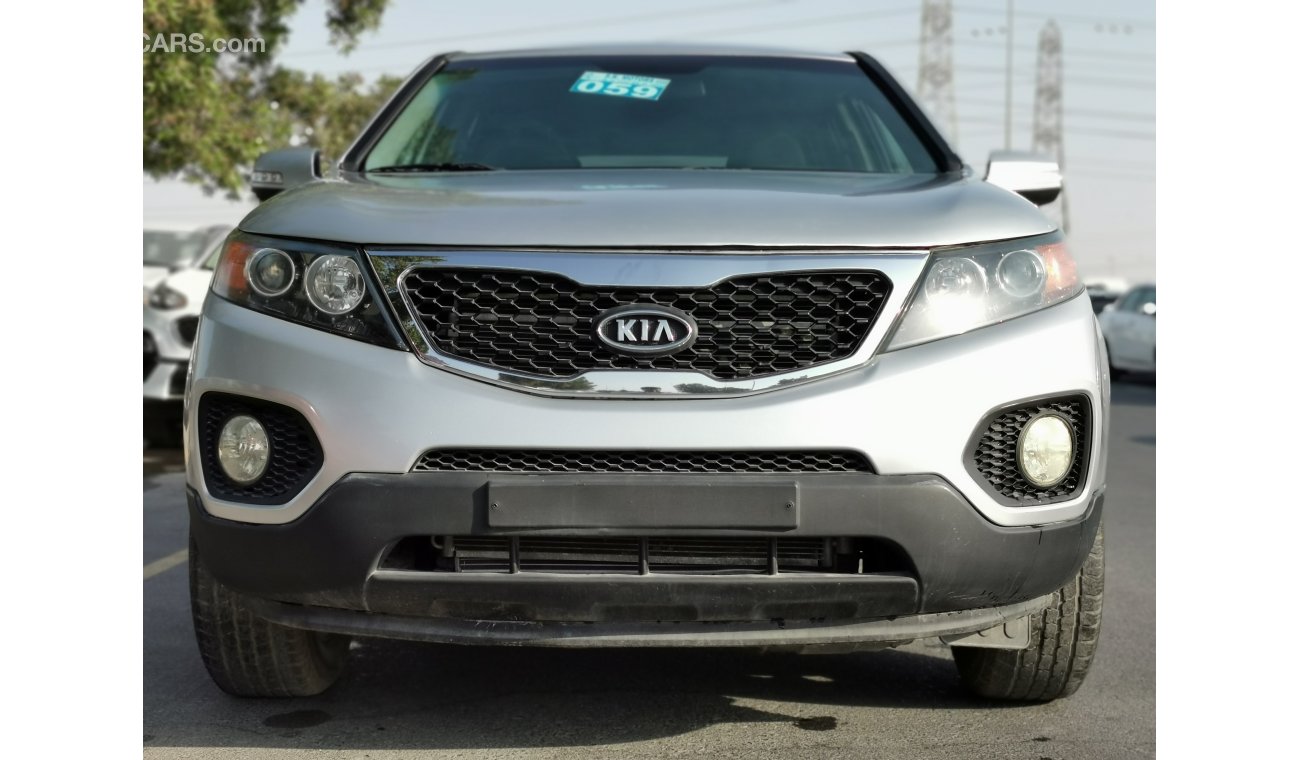 Kia Sorento 2.4L, 17" Rims, DRL LED Headlights, Active ECO Control, Bluetooth, Fabric Seats, USB (LOT # 241)