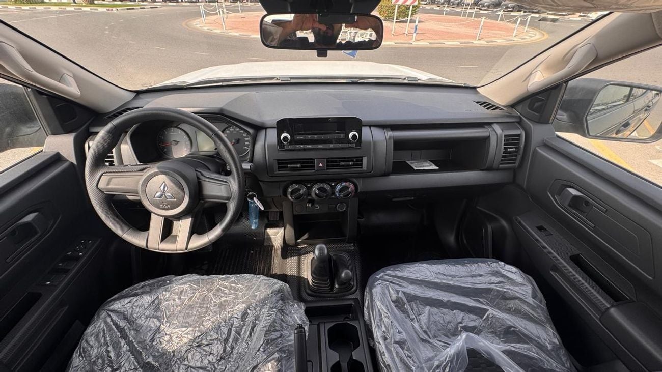 Mitsubishi L200 DCABIN 2.4L PETROL 4X4 5 MT MID-LINE