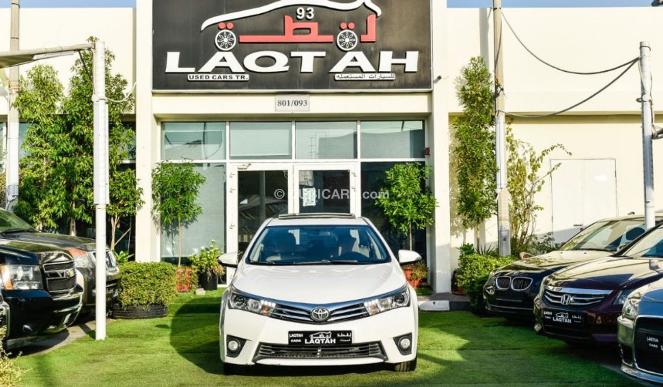 تويوتا كورولا خليجى 2015 رقم واحد فتحة بصمة كاميرا خلفية شاشة تحكم مثبت رنجات حساسات بحالة ممتازة لاتحتاج لمصاريف