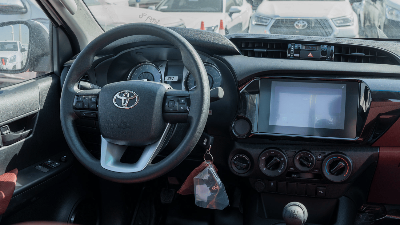 تويوتا هيلوكس ECTCGA003 – 2025 Toyota Hilux Single Cab Pick Up – 2.7L Petrol Manual 4wd - White with Red  Interior