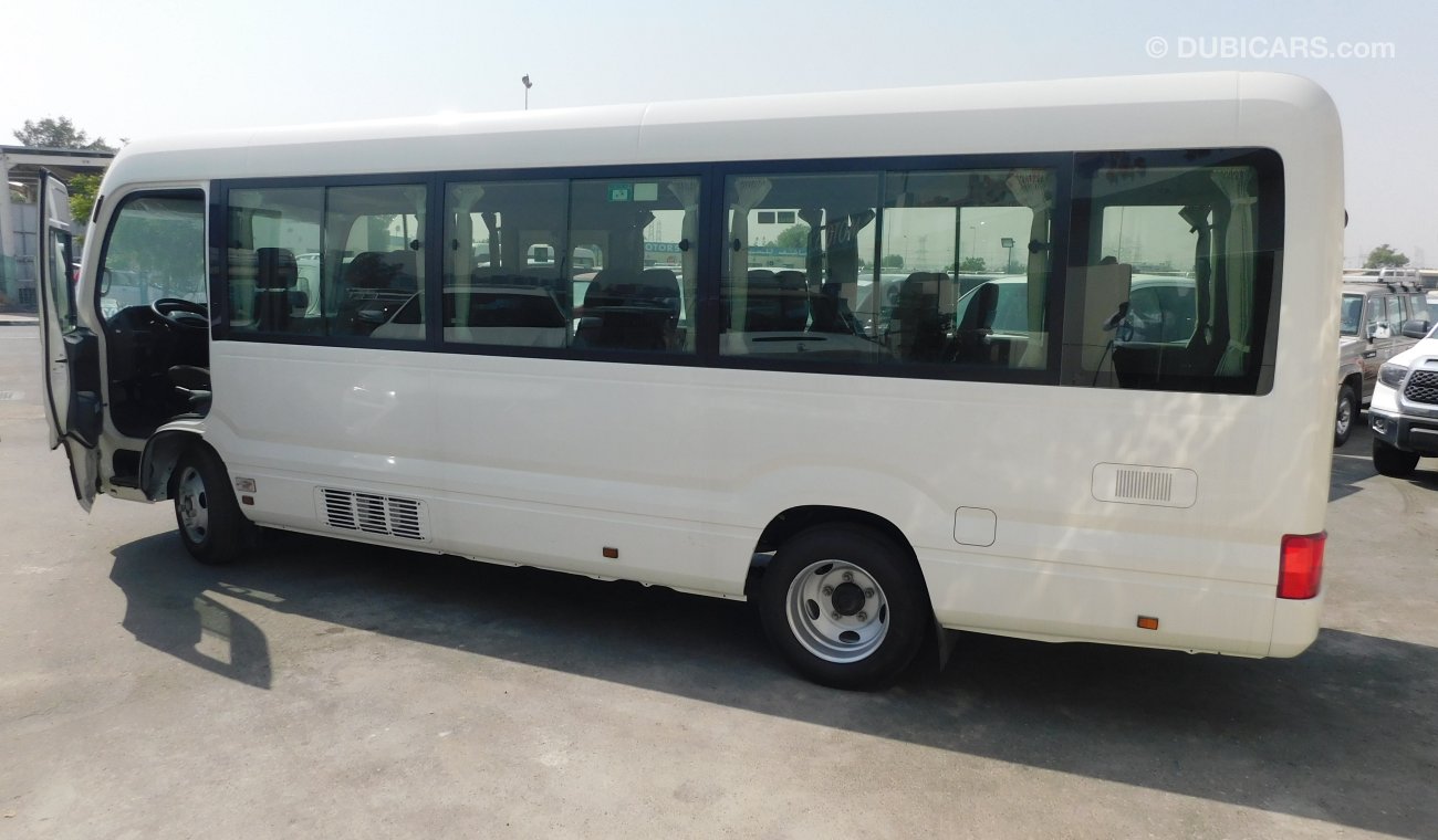 Toyota Coaster 4.2L M/T Diesel 23 passengers - Auto folding door