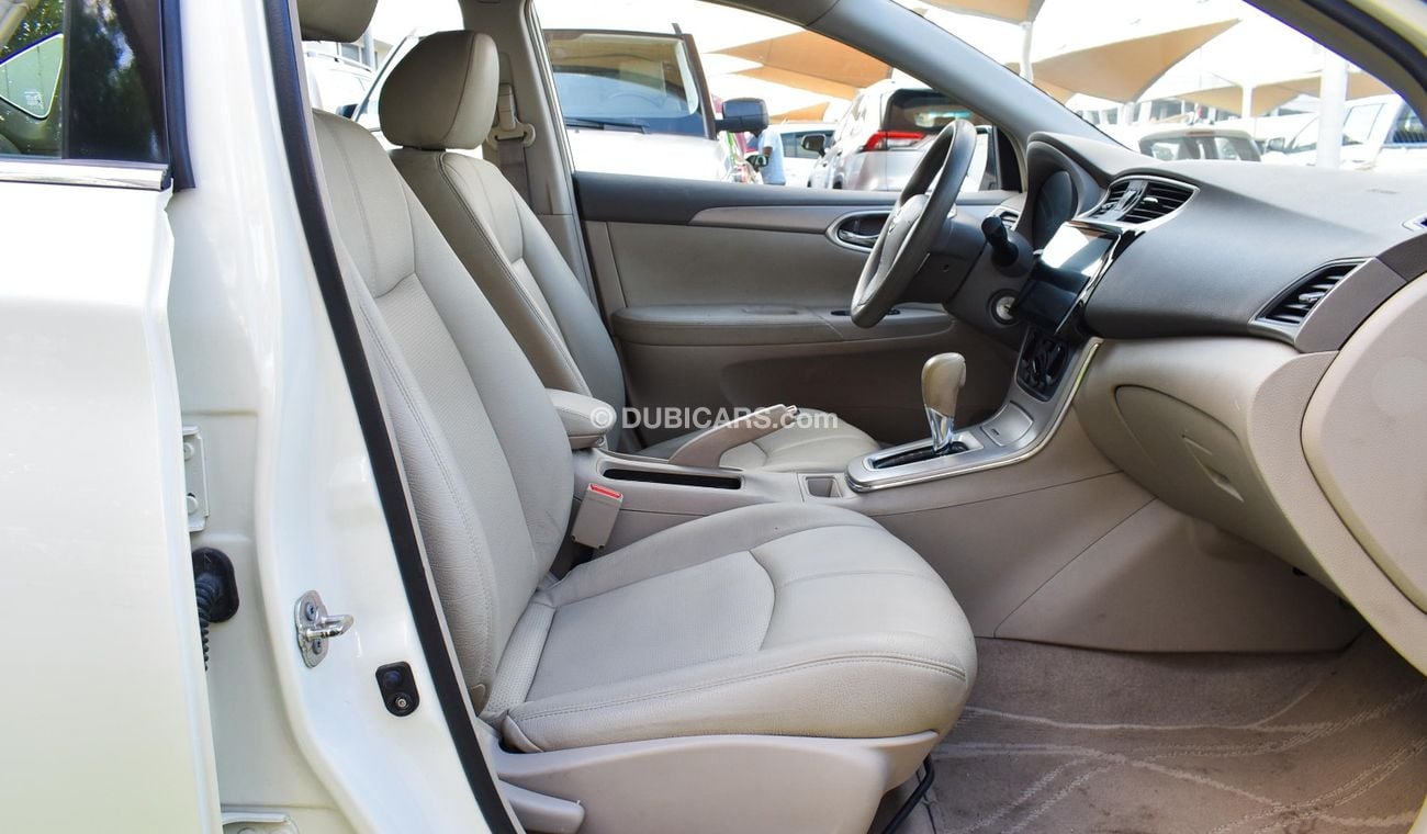 Nissan Sentra GCC, 2016 model, without accidents, white color, beige leather interior, Android screen, rear camera