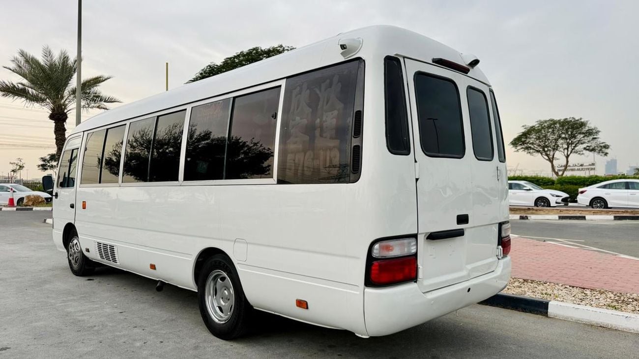Toyota Coaster Fully luxury seats fully covered by cameras