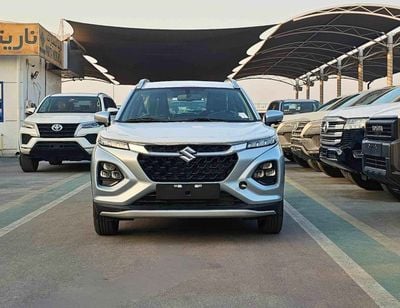 Suzuki Fronx GLX / EURO 5 HYBRID / 1.5L V4 / HEADUP DISPLAY / 360* CAMERAS /" 9" DISPLAY AUDIO (CODE # GLX)