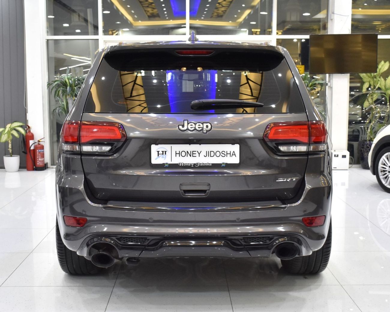 Jeep Grand Cherokee EXCELLENT DEAL for our Jeep Grand Cherokee SRT ( 2015 Model ) in Grey Color GCC Specs