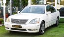 Lexus LS 430 Imported 1/2 Ultra 2006 model, white color, leather opening, wood wheels, electric mirrors, electric