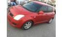 Suzuki Swift clean from the agency's first owner 2009 red color