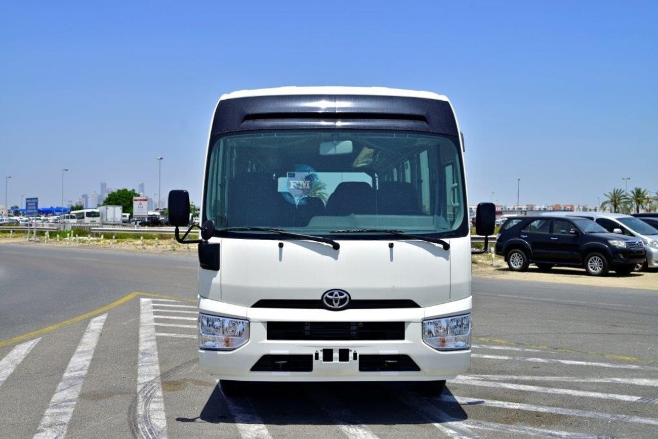 Toyota Coaster 4.0L Diesel High Roof 22 Seater